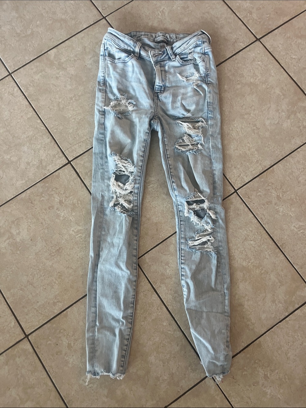 Light Blue Distressed American Eagle Women's Skinny Jeans